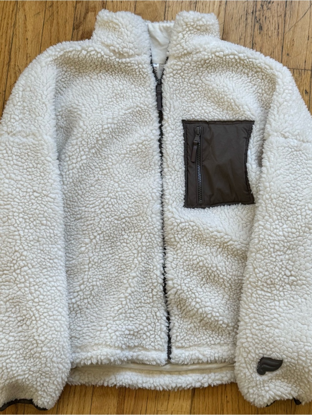 Fabletics White Sherpa Jacket with Contrast Brown Zip Pocket